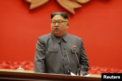 North Korean leader Kim Jong Un makes closing remarks at 5th Conference of Cell Chairpersons of the Workers' Party of Korea (WPK), Dec. 23 in this photo released by North Korea's Korean Central News Agency (KCNA) in Pyongyang, North Korea, Dec. 24, 2017.