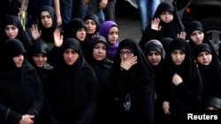 Women mourn during the funeral of top Hezbollah commander Mustafa Badreddine, who was killed in an attack in Syria, in Beirut's southern suburbs, Lebanon, May 13, 2016.