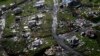 Destroyed communities are seen in the aftermath of Hurricane Maria in Toa Alta, Puerto Rico, Thursday, Sept. 28, 2017. The aftermath of the powerful storm has resulted in a near-total shutdown of the U.S. territory’s economy that could last for weeks and has many people running seriously low on cash and worrying that it will become even harder to survive on this storm-ravaged island.