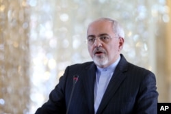 FILE - Iranian Foreign Minister Mohammad Javad Zarif speaks during a press conference with his Danish counterpart Kristian Jensen after their talks in Tehran, Iran, Monday, Jan. 4, 2016.