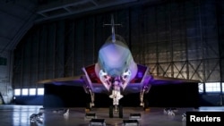 FILE - A Lockheed Martin F-35 Lightning II fighter jet is seen in its hangar at Patuxent River Naval Air Station, in the eastern U.S. state of Maryland, Oct. 28, 2015.