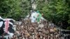  People are seen gathered for a mass anti-government protest in the center of the Algerian capital Algiers, Dec. 17, 2019.