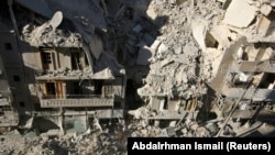 People dig in the rubble in an ongoing search for survivors at a site hit previously by an airstrike in the rebel-held Tariq al-Bab neighborhood of Aleppo, Syria, Sept. 26, 2016.