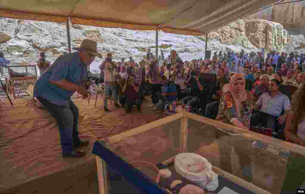 Dr. Zahi Hawass announces his discoveries during a news conference in the Valley of the Monkeys in Luxor's west bank, Egypt. (H. Elrasam/VOA)