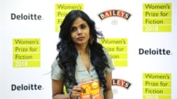 FILE - India's Meena Kandasamy, one of the shortlisted authors for the Women's Prize for Fiction poses in London, June 6, 2018.
