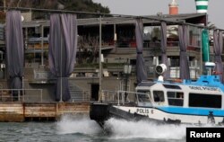 A Turkish coast guard boat patrols in front of the Reina nightclub by the Bosphorus, which was attacked by a gunman, in Istanbul, Jan. 1, 2017.