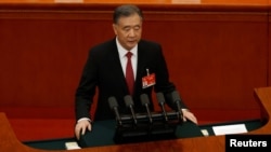 全國政協主席汪洋在中國政協年度會議上作工作報告。（2021年3月4日）