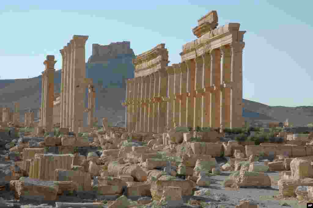 FILE - This undated file image released by UNESCO shows the site of the ancient city of Palmyra in Syria.
