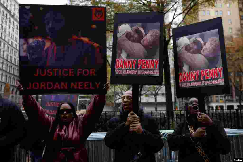 People demonstrate outside Manhattan Criminal Court on the day a jury continues deliberations in the trial of Daniel Penny, the former U.S. Marine sergeant facing charges of manslaughter and criminally negligent homocide for fatally strangling Jordan Neely, a homeless man, on a New York City subway car in 2023, in New York City. Penny was found not guilty of criminally negligent homicide in Neely's death.