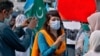 In this Sept. 11, 2020 photo, Mona Khan, a freelance female journalist, conducts an interview in Islamabad, Pakistan. 