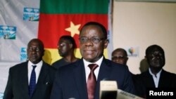 FILE - ameroon's opposition leader Maurice Kamto speaks at a news conference in Yaounde, Cameroon, Oct. 8, 2018.