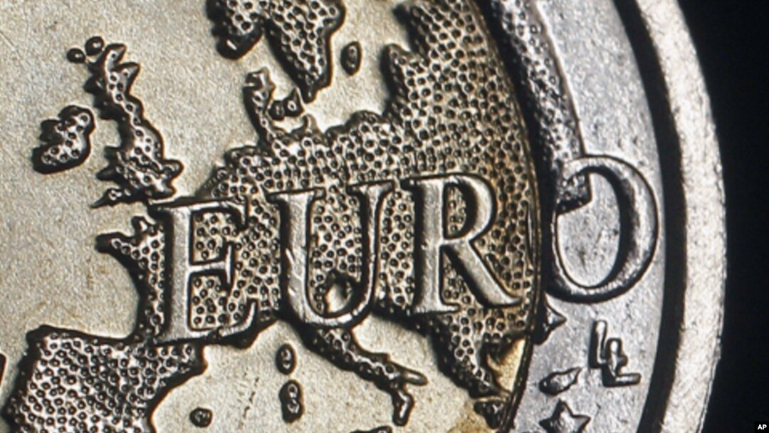The map of Europe is featured on the face of a two Euro coin seen in this photo illustration taken in Rome, (December 2011 file photo)