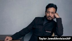 FILE - Actor Irrfan Khan poses for a portrait to promote the film "Puzzle" during the Sundance Film Festival in Park City, Utah, Jan. 22, 2018.