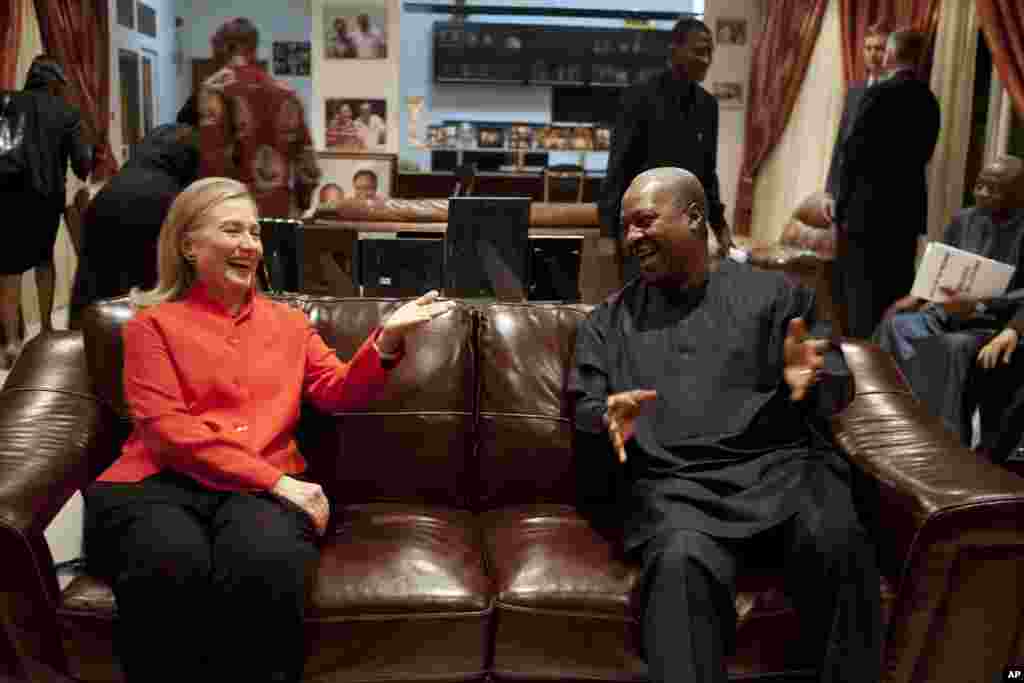 U.S. Secretary of State Hillary Clinton, left, meets with Ghana's President John Dramani Mahama, at his residence in Accra, Ghana, August 9, 2012.