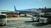 Pesawat milik maskapai All Nippon Airways yang disewa pemerintah Jepang untuk mengevakuasi warga Jepang di Wuhan, China, tiba di apron kedatangan di Bandara Haneda, Tokyp, Rabu, 29 Januari 2020. Mereka adalah warga Jepang pertama dievakuasi dari Wuhan terkait wabah corona. 