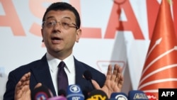Turkey's main opposition party CHP candidate Ekrem Imamoglu, who claimed victory as Istanbul's mayor, speaks during a press conference at the CHP's Election Coordination Centre in Istanbul, April 3, 2019.