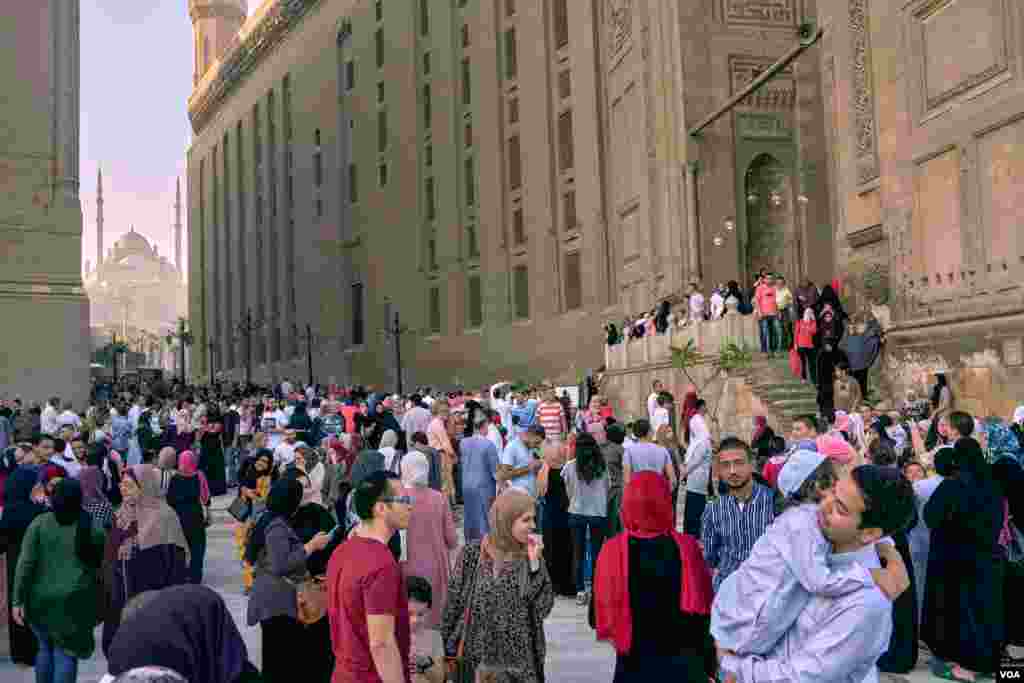 Muslims of Egypt gathered at the ancient mosque of Sultan Hassan for the Muslims Sacrifice feast -Eid Al-Adha- prayers as early as the sunrise in Old Cairo, Aug. 11, 2019. (H. Elrasam/VOA)