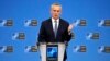 Sekjen NATO Jens Stoltenberg berbicara kepada media di Brussel, Belgia hari Senin (27/11). 