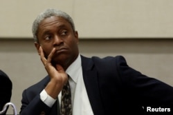 FILE - Federal Reserve Bank of Atlanta President Raphael Bostic participates in a panel discussion in Atlanta, Georgia, Jan. 4, 2019.