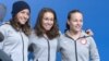 U.S. ski jumpers Jessica Jerome, Sarah Hendrickson and Lindsey Van speak to the media in Sochi, Feb. 10, 2014. (Parke Brewer/VOA)