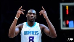 Bismack Biyombo #8 of the Charlotte Hornets reacts during the second half of their game against the Brooklyn Nets at Barclays Center in New York City. 