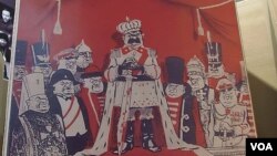 2012年末在莫斯科举办的苏共迫害宗教展览中的漫画。(美国之音白桦拍摄) 