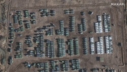 This handout satellite image taken Nov. 1, 2021, and released by Maxar Technologies shows the presence of a large ground force deployment near Yelnya, Smolensk region, Russia, about 260 kilometers (160 miles) north of the Ukrainian border.