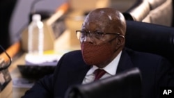 Former South African President Jacob Zuma appears at the hearing for his application for Deputy Chief Justice Raymond Zondo, to recuse himself from the state capture commission inquiry in Johannesburg, South Africa, Nov. 16, 2020.