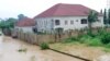 Newly-built houses on the bank of the River Kaduna are seen in flood waters after hours of rainfall in Kaduna, Nigeria August 15, 2015.