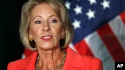 Education Secretary Betsy DeVos speaks about campus sexual assault and enforcement of Title IX, the federal law that bars discrimination in education on the basis of gender, Sept. 7, 2017, at George Mason University Arlington, Va., campus.