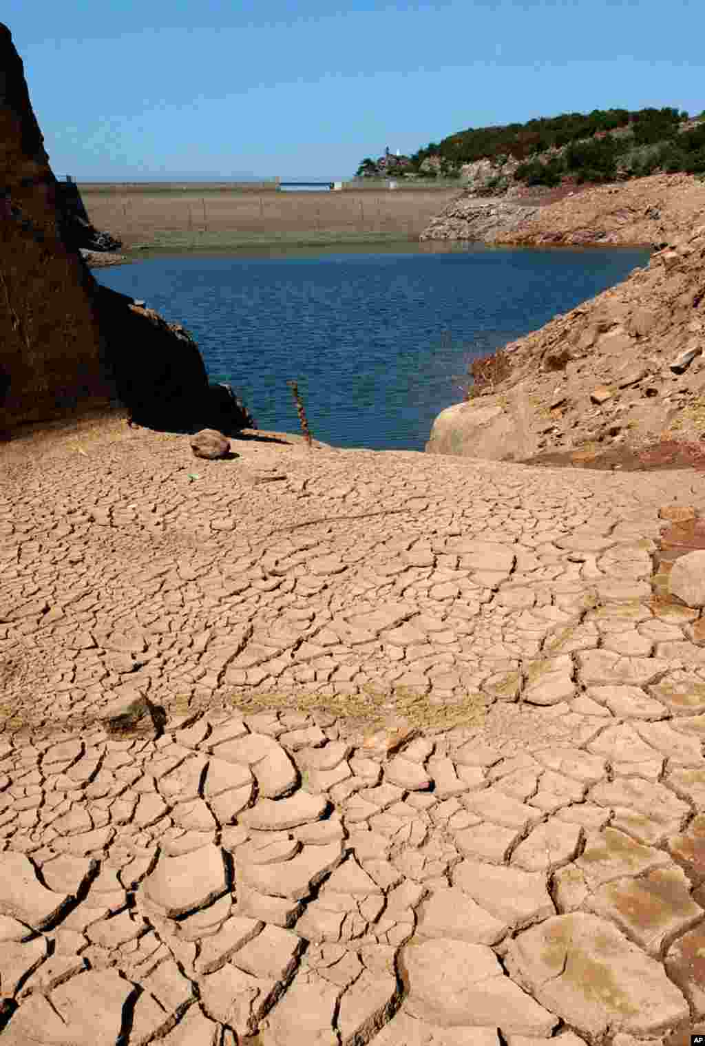 In this 2003 file photo, the Ibardin lake in southern France was almost dry due to a heat wave that killed 71,000 people, making it the most deadly heat wave in the world to date. 