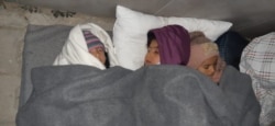 Children sleep in the streets after being released from quarantine in Izmir, Turkey, April 13, 2020. (Photo courtesy of refugees)
