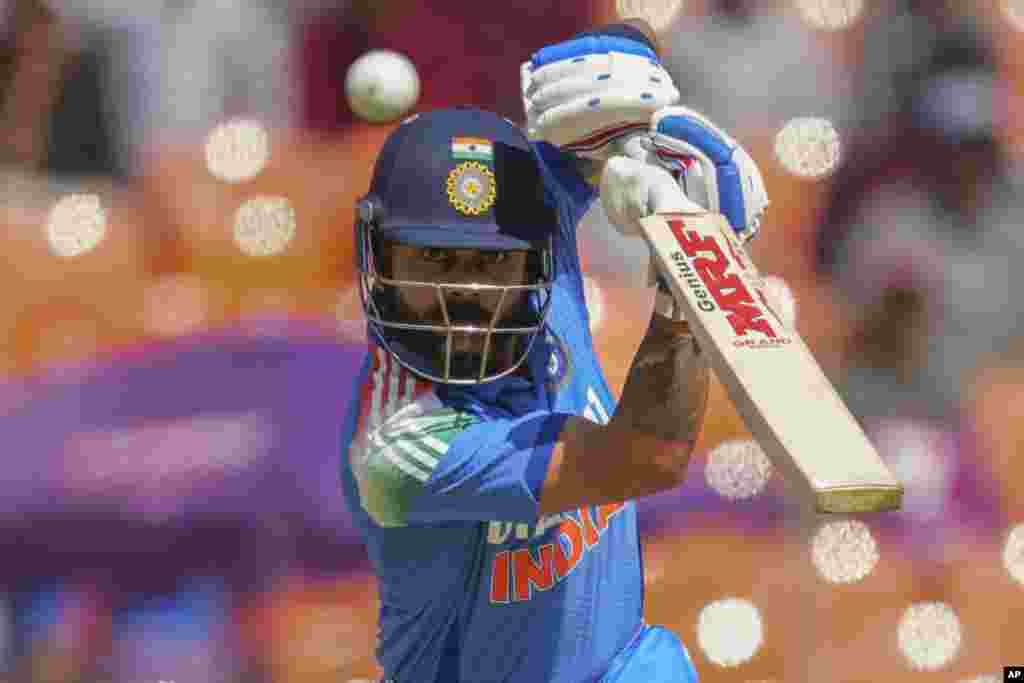 India's Virat Kohli plays a shot during the third one day international cricket match between India and England in Ahmedabad, India.