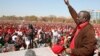 Leader of Zimbabwe's opposition party Movement For Democratic Change (MDC) Prime Minister Morgan Tsvangirai greets supporters at a rally in Harare, July 29, 2013.
