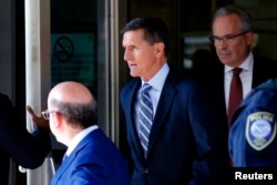 Former U.S. National Security Adviser Michael Flynn departs U.S. District Court, where he was expected to plead guilty to lying to the FBI about his contacts with Russia's ambassador to the United States, in Washington, Dec. 1, 2017.