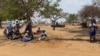 Patients wait for service outside Chesa Rural Clinic in Mount Darwin district, about 200 km north of Harare, Nov. 04, 2021. The government is opening more such clinics to help people with conditions like diabetes. (Columbus Mavhunga/VOA)