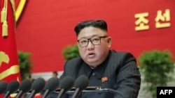 Foto pemimpin Korea Utara, Kim Jong Un, yang dirilis oleh kantor berita pemerintah Korea Utara, Korean Central News Agency (KCNA), Sabtu, 9 Januari 2021.