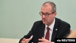 FILE - Hans Kluge, World Health Organization regional director for Europe, attends a meeting in Moscow, Russia, Sept. 23, 2020. (Sputnik/via Reuters) 