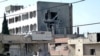  As Syrian Government Claims Pullout, Activists Report Attacks