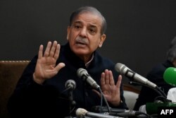 Pakistan's former prime minister and leader of the Pakistan Muslim League-Nawaz (PML-N) party Shehbaz Sharif speaks during a press conference in Lahore, Feb. 13, 2024.