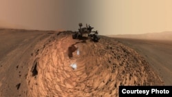 This low-angle self-portrait of NASA's Curiosity Mars rover shows the vehicle above the "Buckskin" rock target, where the mission collected its seventh drilled sample. (Credit: NASA)