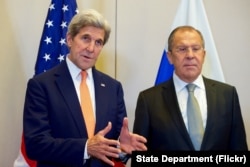 U.S. Secretary of State John Kerry, flanked by Russian Foreign Minister Sergey Lavrov, answers a reporter's question on Sept. 9, 2016, at the Hotel President Wilson in Geneva, Switzerland, before they begin a bilateral meeting focused on Syria.