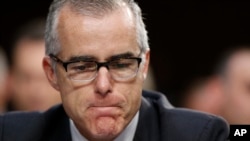 FILE - Then-acting FBI Director Andrew McCabe pauses during a Senate Intelligence Committee hearing about the Foreign Intelligence Surveillance Act, on Capitol Hill, June 7, 2017, in Washington.