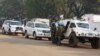 FILE - U.N. peacekeepers take a break as they patrol along a street during the presidential election in Bangui, the capital of Central African Republic, Dec. 30, 2015. 