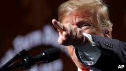 President Donald Trump speaks at the American Farm Bureau Federation's 100th Annual Convention, Monday Jan. 14, 2019, in New Orleans. 