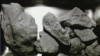 Apollo Moon Rocks Suggest Other Planet Hit Young Earth