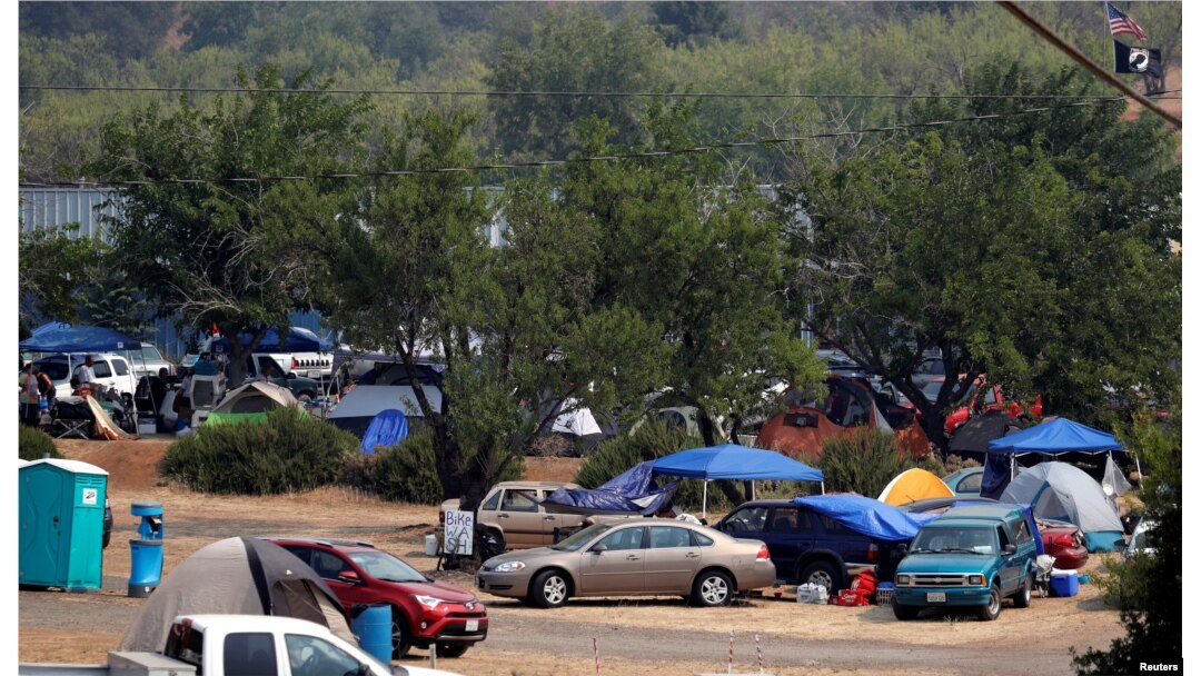 Evacuees from the Ranch Fire and River Fire (Mendocino Complex) are living in motor homes, cars and tents in the parking lot of the Moose Lodge in Clearlake Oaks, Calif., Aug. 2, 2018.