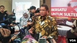 Menteri Komunikasi dan Informatika Rudiantara menjelaskan di Jakarta. Selasa (2/10). (VOA/A.Bhagaskoro)