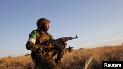 Militar moçambicano em treinos da União Africana, África do Sul, 2015