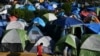 AS Tambahkan Kota Keenam dalam Program Permulangan Migran Meksiko